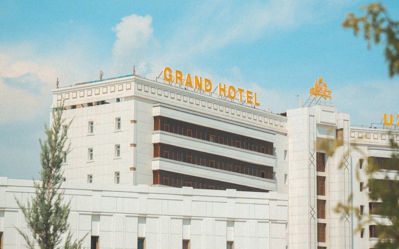 white hotel under blue sky during daytime