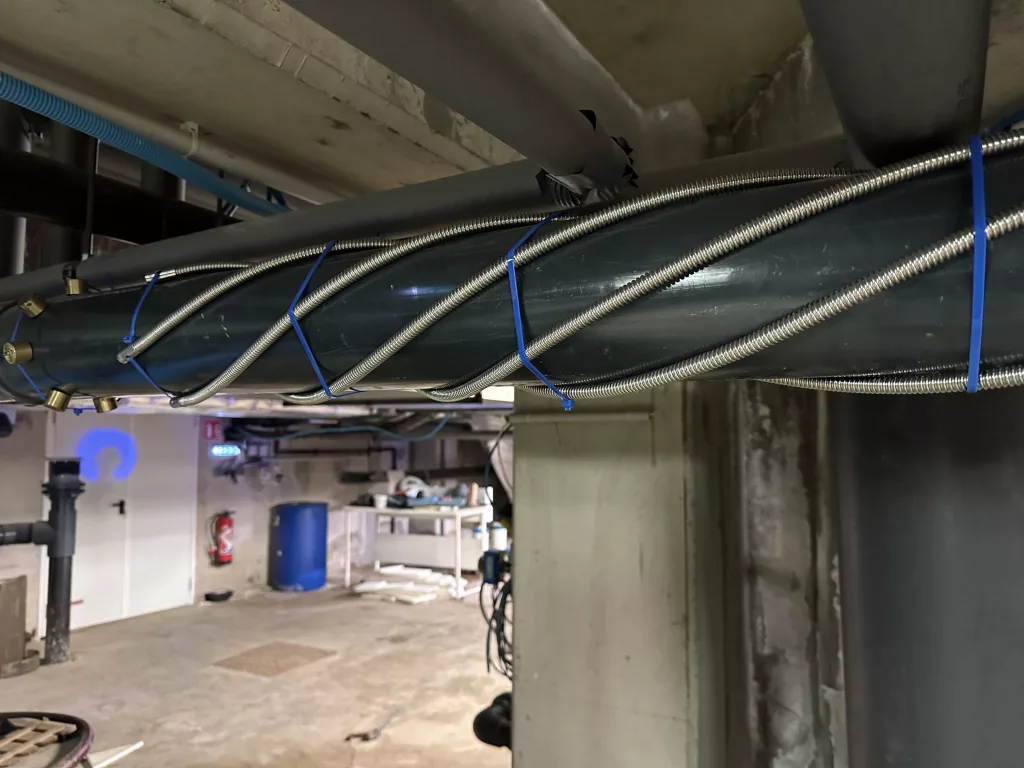 E-Acti'Water+ installed around the filter loop of a commercial swimming pool