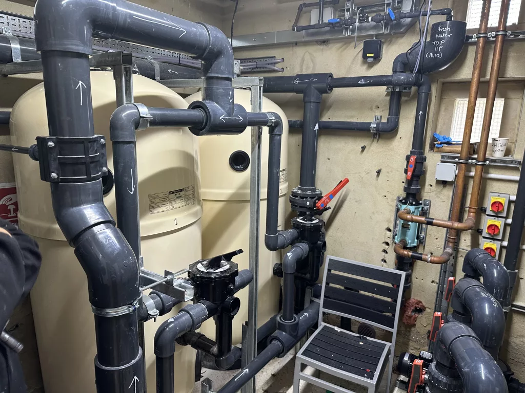 Swimming pool plant room with sand filters