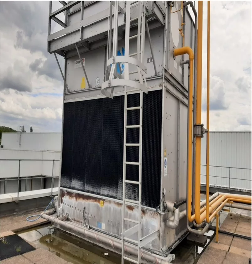 Cooling tower and condenser system for heat rejection